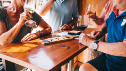Friends enjoying food and wine near our St. Augustine rentals