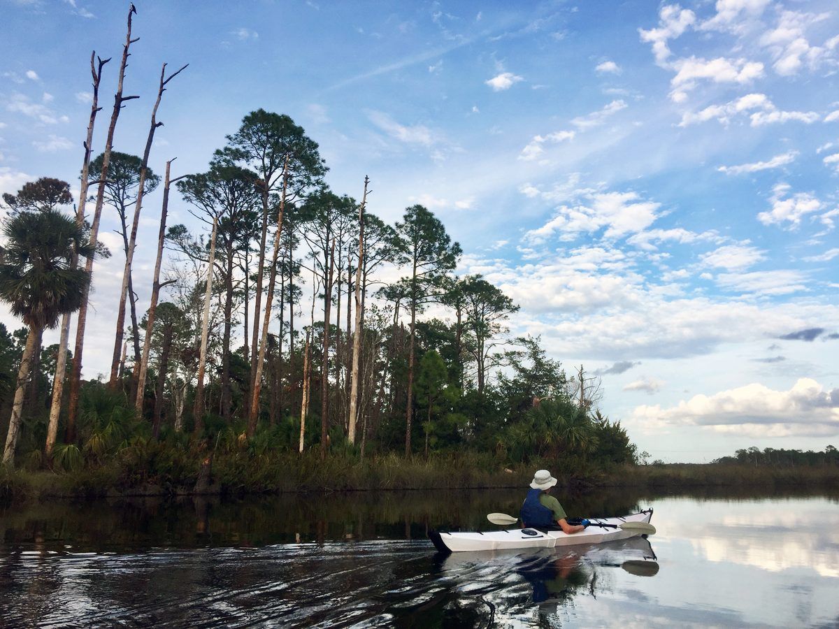man kayaking  on mantazanas river in st augustine